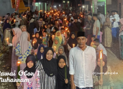Kepala Desa Rajudin Turun Langsung Pimpin Pawai Obor 1 Muharram di Lewi Co’o